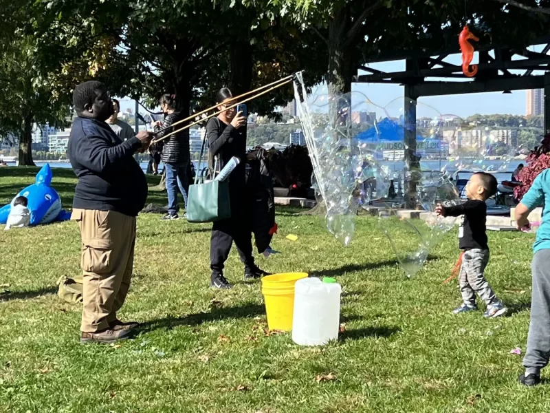 Family playing bubbles